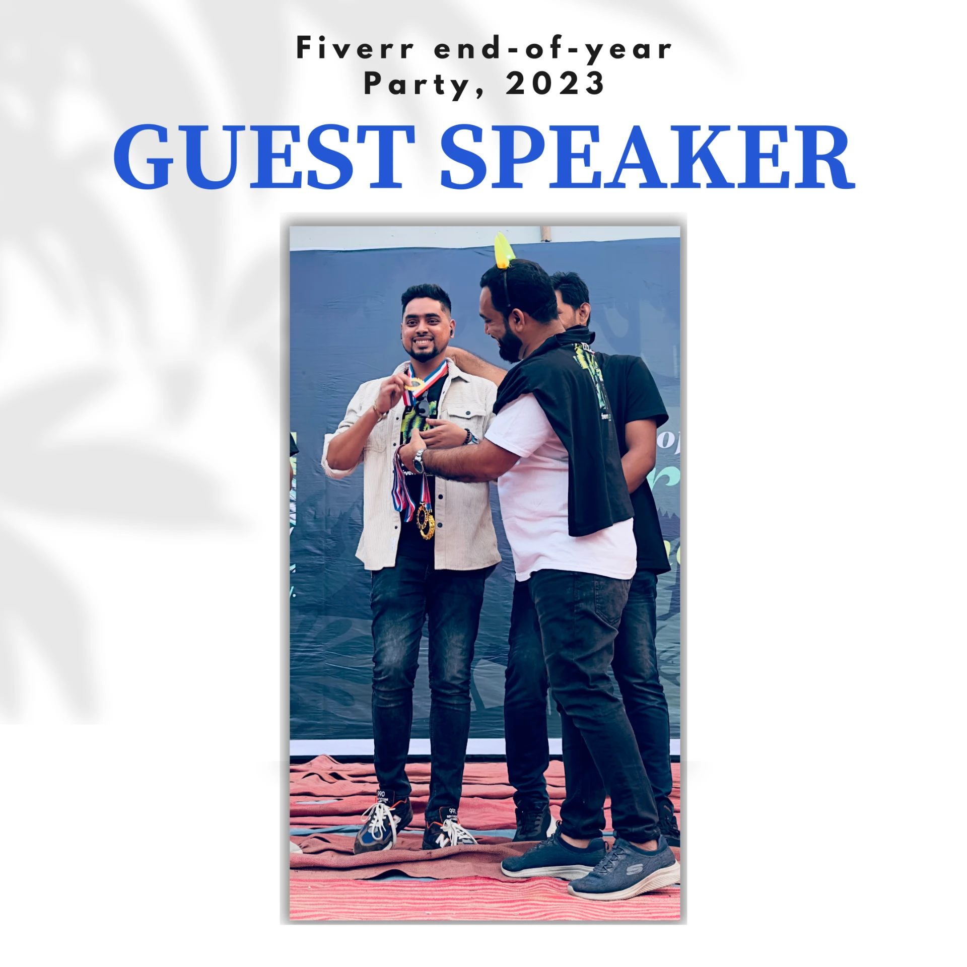 Shuvo receiving a medal on stage at the Fiverr end-of-year community event, 2023